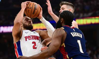 Detroit Pistons guard Cade Cunningham (2) drives to the basket against Cleveland Cavaliers guard James Harden (1) and forward Dean Wade (32) during the first half of game four in the second round of the 2026 NBA Playoffs at Rocket Arena.