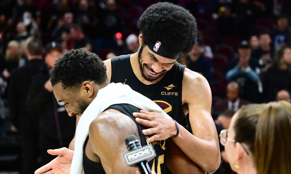 Cleveland Cavaliers guard Donovan Mitchell (45) hugs Cleveland Cavaliers center Jarrett Allen (31) after game seven against the Toronto Raptors In the first round of the 2026 NBA Playoffs at Rocket Arena.