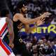 Cleveland Cavaliers center Jarrett Allen (31) passes defended by Detroit Pistons center Jalen Duren (0) in the first half during game one of the second round of the 2026 NBA Playoffs at Little Caesars Arena.