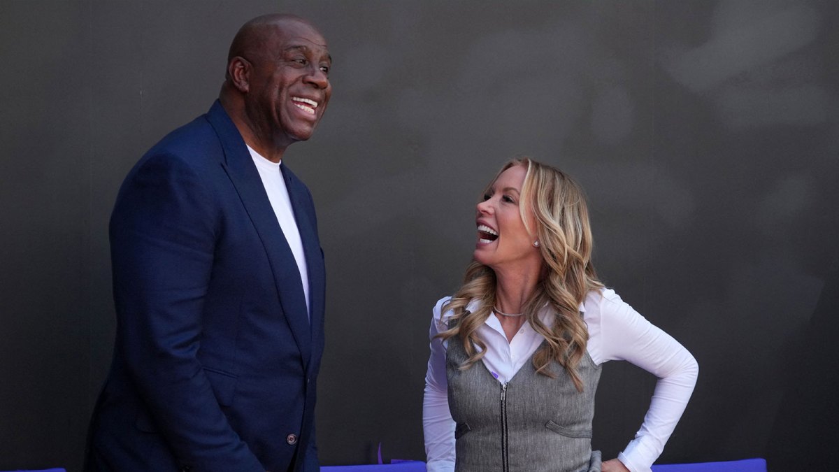 Magic Johnson (left) and Jeanie Buss at unveiling of statue of former Los Angeles Lakers coach Pat Riley at the Crypto.com Arena.