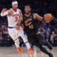 Cleveland Cavaliers guard Donovan Mitchell (45) dribbles against New York Knicks guard Josh Hart (3) during the second quarter of game one of the eastern conference finals during the 2026 NBA playoffs at Madison Square Garden.
