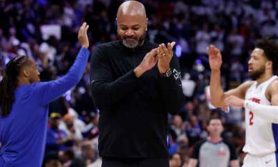 Pistons head coach J.B. Bickerstaff claps in the first half