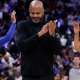 Pistons head coach J.B. Bickerstaff claps in the first half
