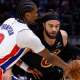 Detroit Pistons guard Ausar Thompson (9) knocks the ball from Cleveland Cavaliers guard/forward Max Strus (2) in the first half during game two of the second round of the 2026 NBA Playoffs at Little Caesars Arena.