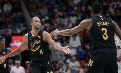 Cavs center Evan Mobley (4) celebrates with center Thomas Bryant (3) during the first half at Smoothie King Center with Jarrett Allen in the background