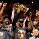 Cleveland Cavaliers forward LeBron James (23) and the Cleveland Cavaliers celebrates with the Larry O'Brien Championship Trophy after beating the Golden State Warriors in game seven of the NBA Finals at Oracle Arena.