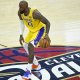 Los Angeles Lakers forward LeBron James (23) brings the ball up court in the fourth quarter against the Cleveland Cavaliers at Rocket Arena.