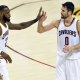 Cleveland Cavaliers forward LeBron James (23) and forward Kevin Love (0) celebrate in the third quarter against the Memphis Grizzlies at Quicken Loans Arena.