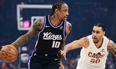 Sacramento Kings guard DeMar DeRozan (10) drives to the basket against Cleveland Cavaliers guard Jaylon Tyson (20) during the first quarter at Rocket Arena.