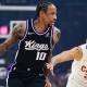 Sacramento Kings guard DeMar DeRozan (10) drives to the basket against Cleveland Cavaliers guard Jaylon Tyson (20) during the first quarter at Rocket Arena.