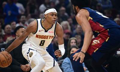 Denver Nuggets guard Peyton Watson (8) looks to drive on Cleveland Cavaliers center Jarrett Allen (31) during the first half at Rocket Arena.
