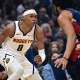 Denver Nuggets guard Peyton Watson (8) looks to drive on Cleveland Cavaliers center Jarrett Allen (31) during the first half at Rocket Arena.