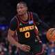 Atlanta Hawks forward Jonathan Kuminga (0) dribbles during the second half of the 2026 NBA Playoffs against the New York Knicks at Madison Square Garden.
