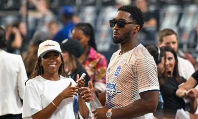 Cleveland Cavaliers shooting guard Donovan Mitchell (right) attends the Queens Classic match between Washington Spirit and Gotham FC at Citi Field.