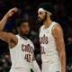 Cleveland Cavaliers guard Donovan Mitchell (45) talks to center Jarrett Allen (31) during the second half against the Portland Trail Blazers at Moda Center.