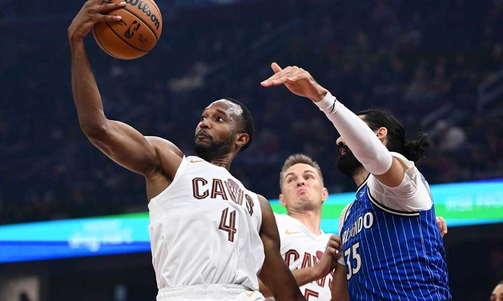 Cleveland Cavaliers center Evan Mobley (4) goes for a rebound against Orlando Magic center Goga Bitadze (35) during the first half at Rocket Arena.
