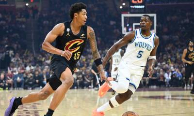 Cleveland Cavaliers guard Meleek Thomas (15) dribbles beside Minnesota Timberwolves guard Anthony Edwards (5) in the first quarter at Rocket Arena.